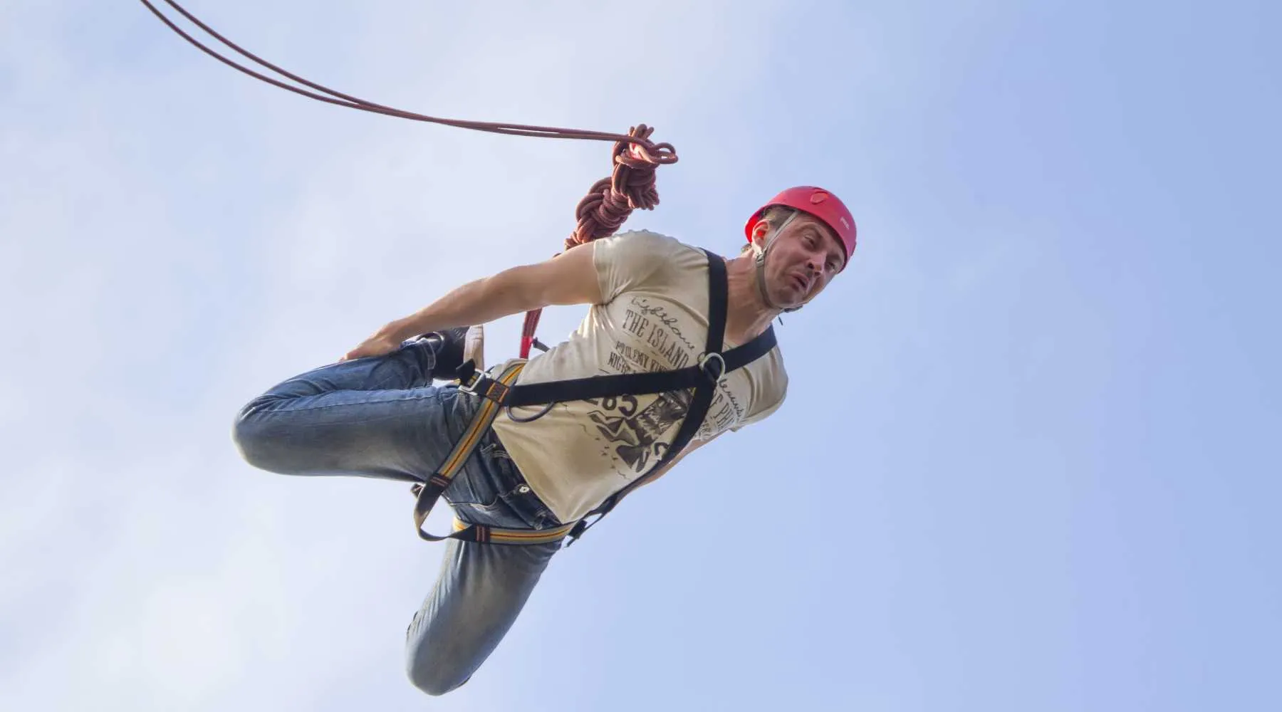 Man bungee jumping on holiday