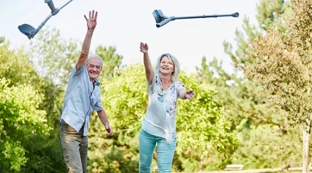elderly couple ditch crutches throw health
