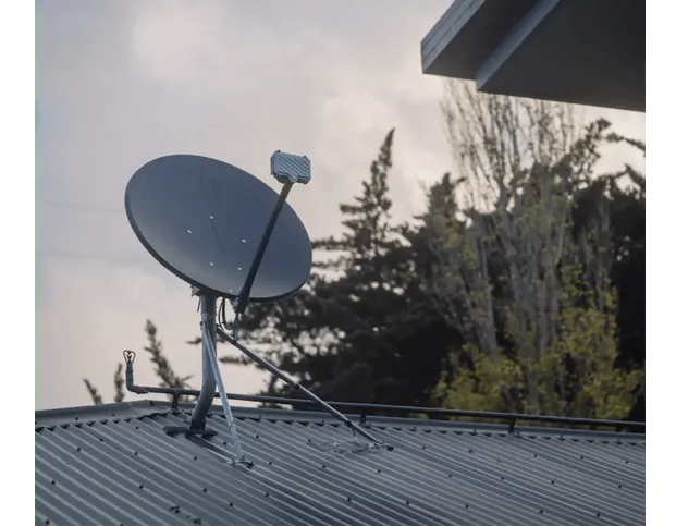 Satellite NBN dish on top of house