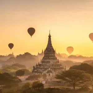 tourist hot air balloon over Ancient Pagoda at Bagan in Myanmar, tourists watching sunrise over ancient city (tourist hot air balloon over Ancient Pagoda at Bagan in Myanmar, tourists watching sunrise over ancient city, ASCII, 109 components, 109 byte
