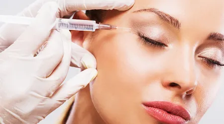 Woman receiving botox injection