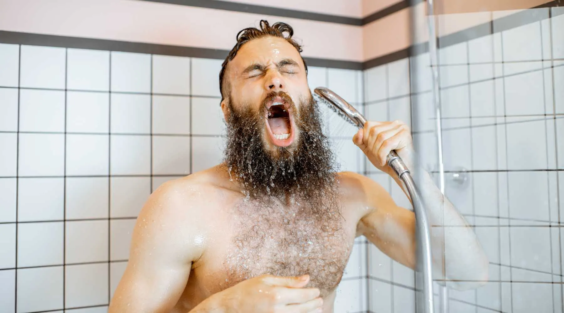 Man having a cold shower