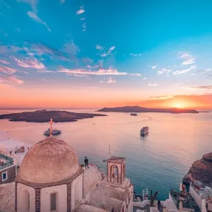 Amazing evening landscape of Fira, infinity pool caldera view Santorini, Greece with cruise ships at sunset. Cloudy dramatic sky sunset, wonderful summer scenery, travel vacation, holiday. Inspire