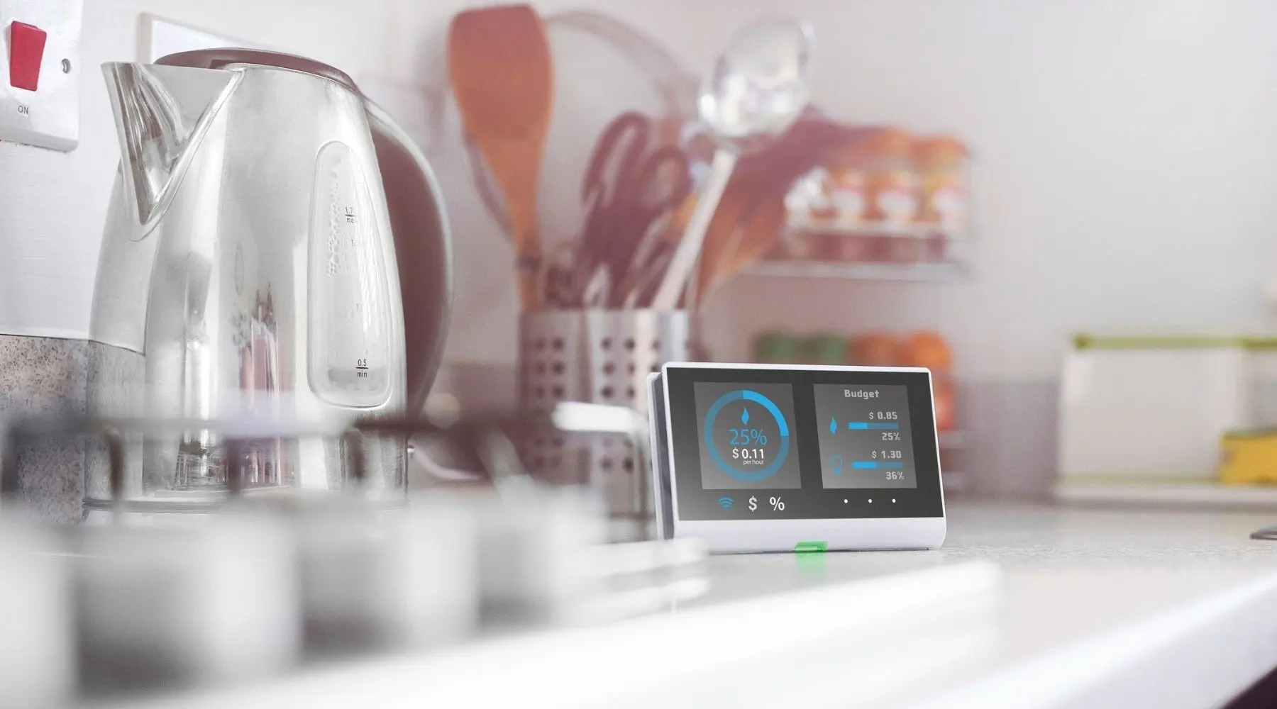 An energy tracker sitting on a kitchen counter.