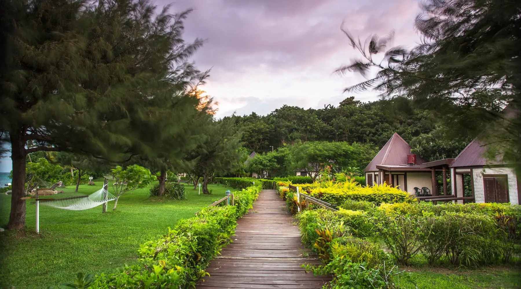 A pathway leads to bungalow accommodation in Fiji.