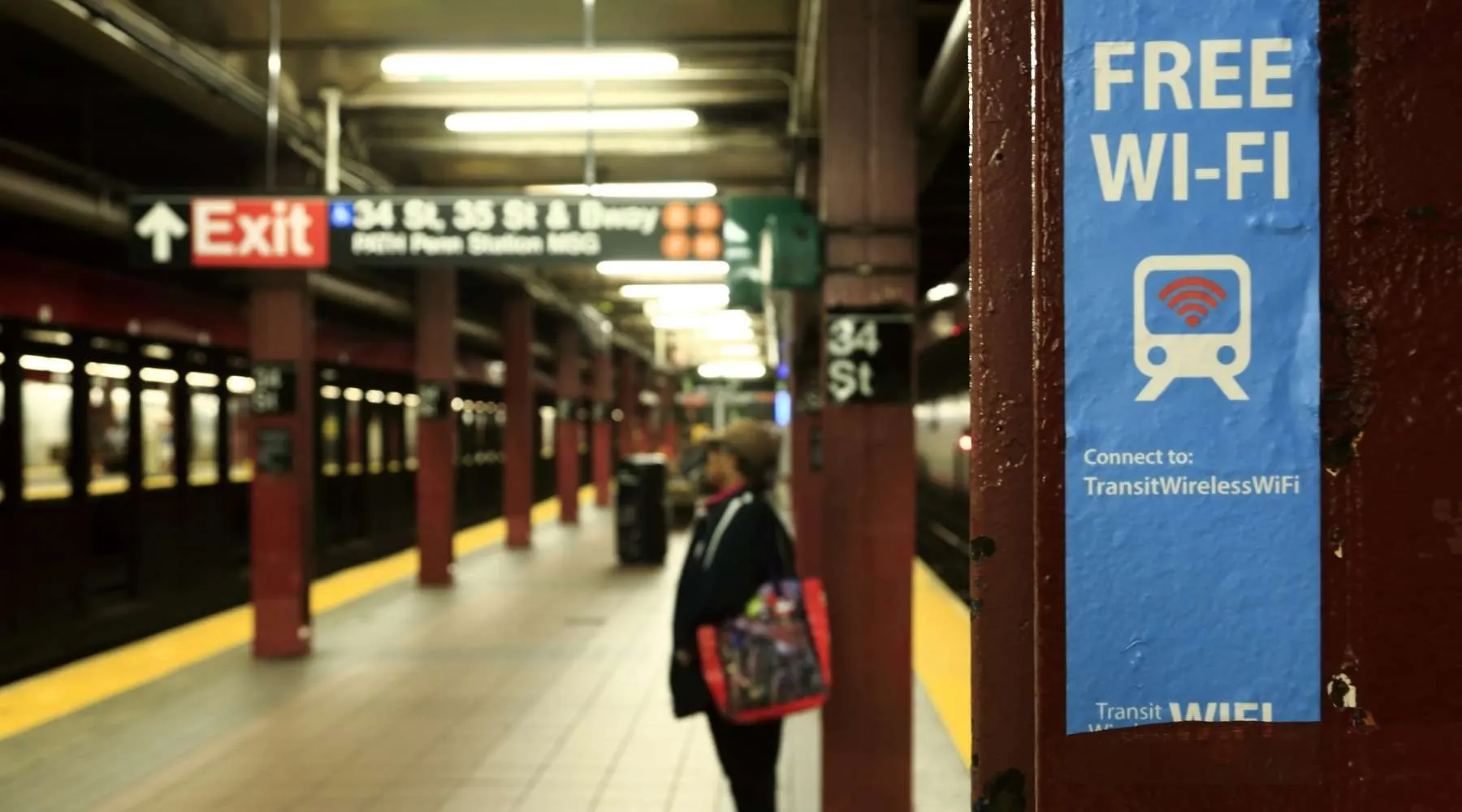 A sign marking the free Wi-Fi spot inside of 34th street subway station.