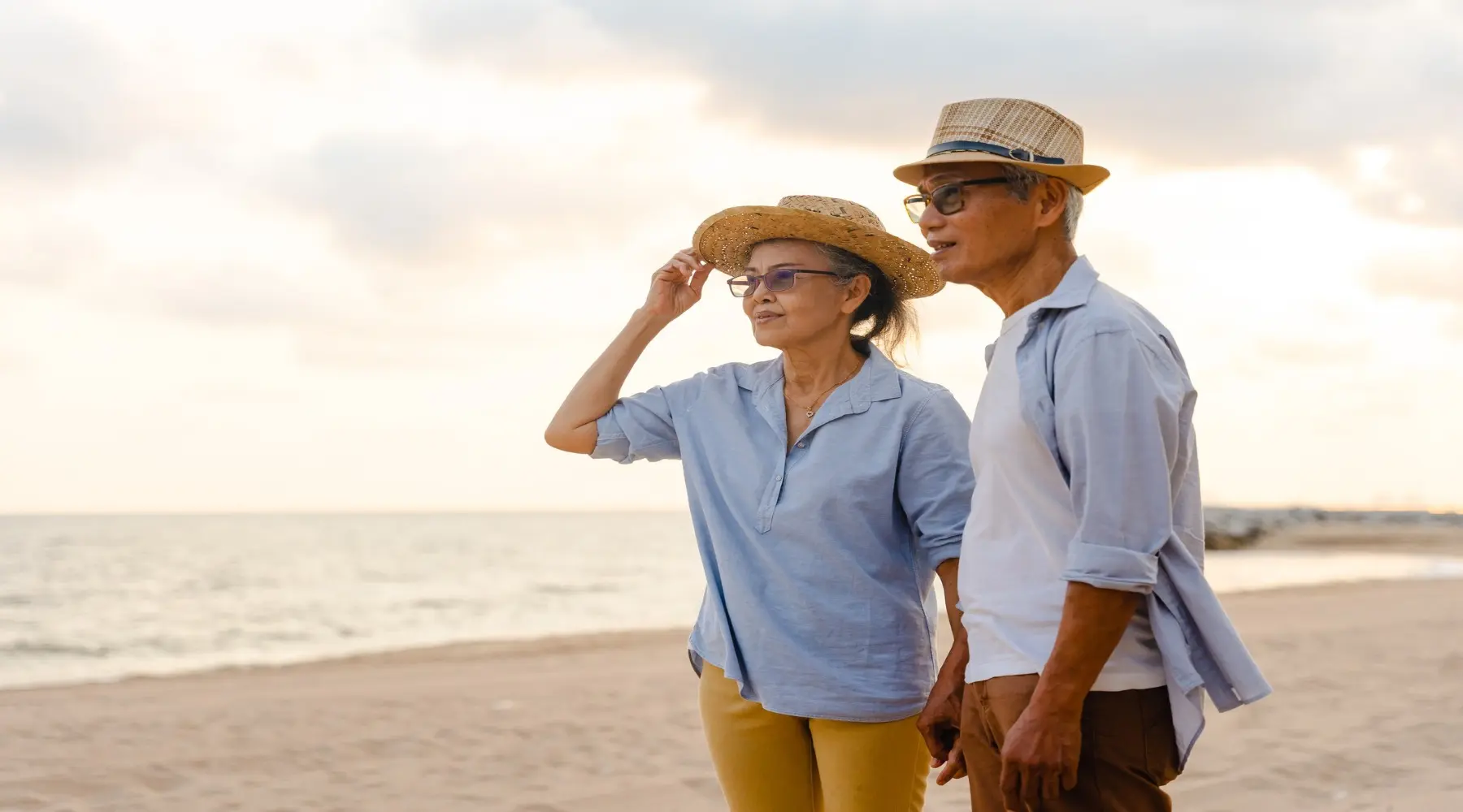 Older couple at beach_GettyImages_1800x1000