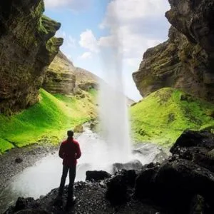 A man watching waterfalls