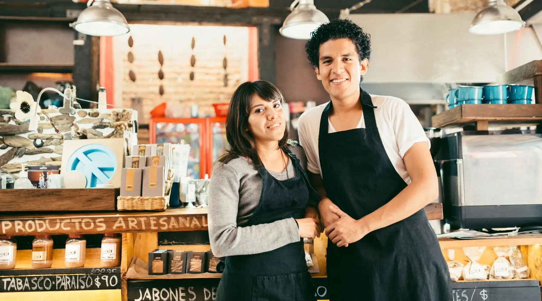 Small_Business_Owners_Standing_Together_Canva_1800x1000