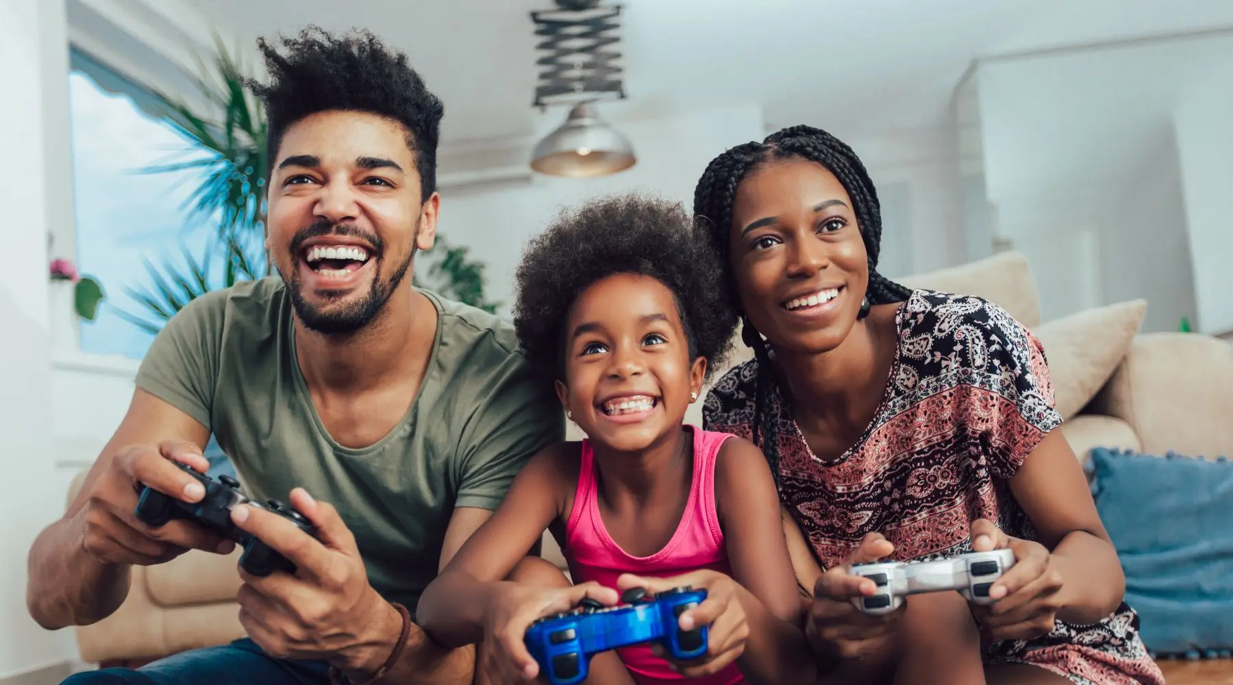 Family playing video games together