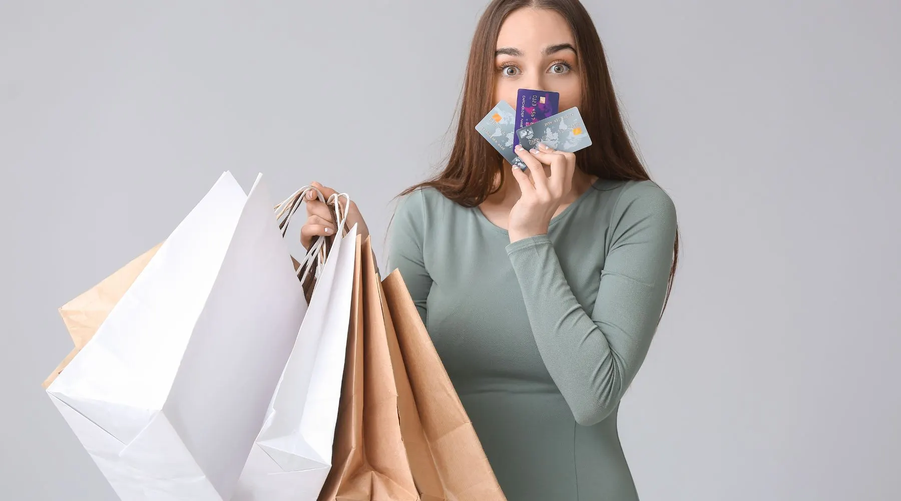 Woman with credit cards_Canva_1800x1000