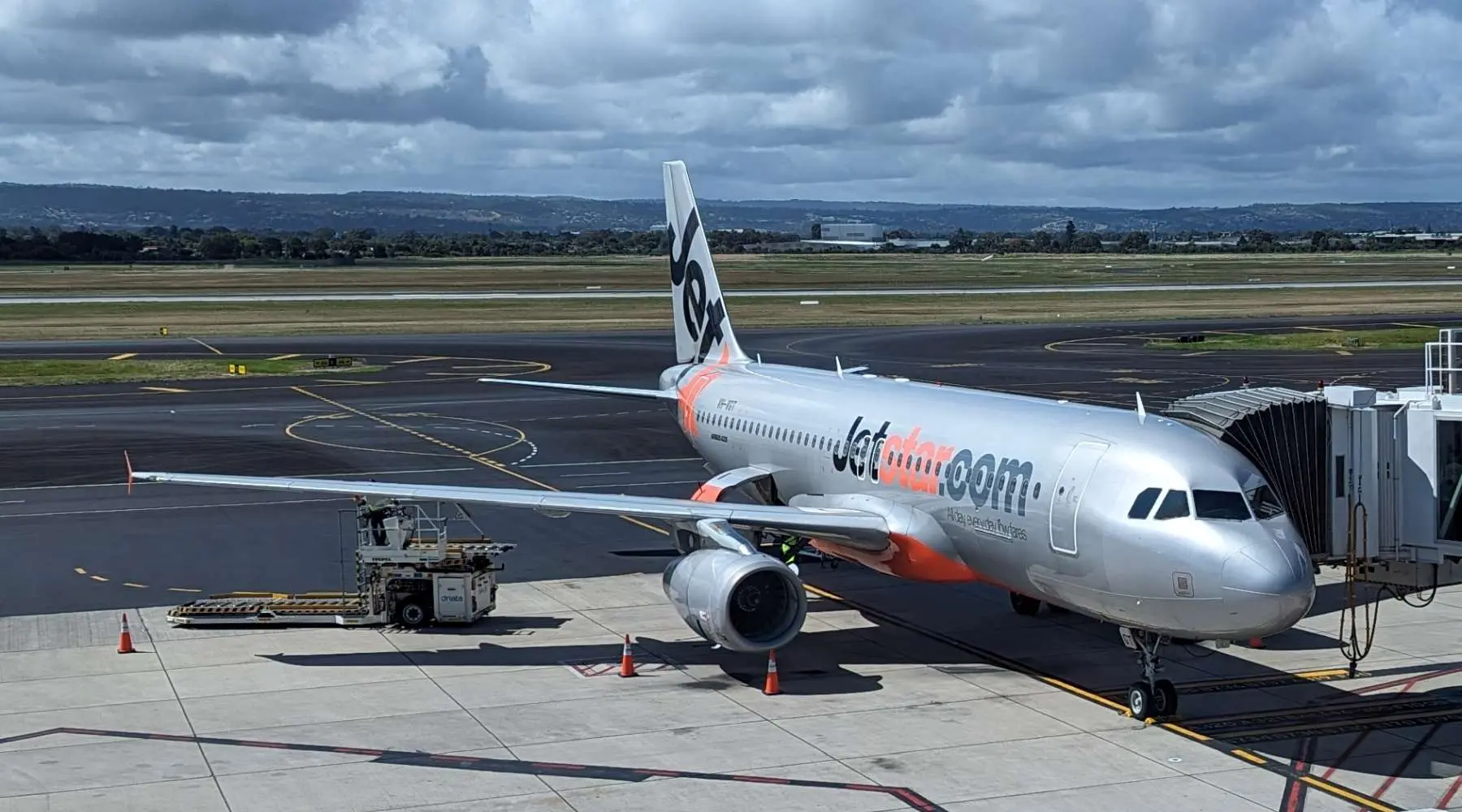A Jetstar plane parked at Adelaide Airport