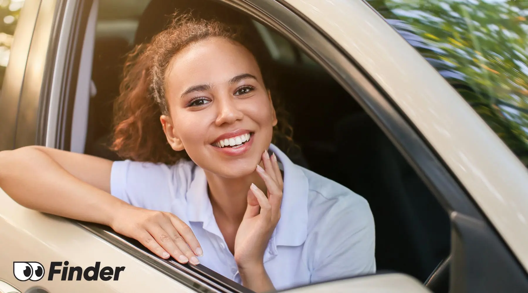 Young_Woman_Driving_Car_New_Logo_Canva_1800x1000