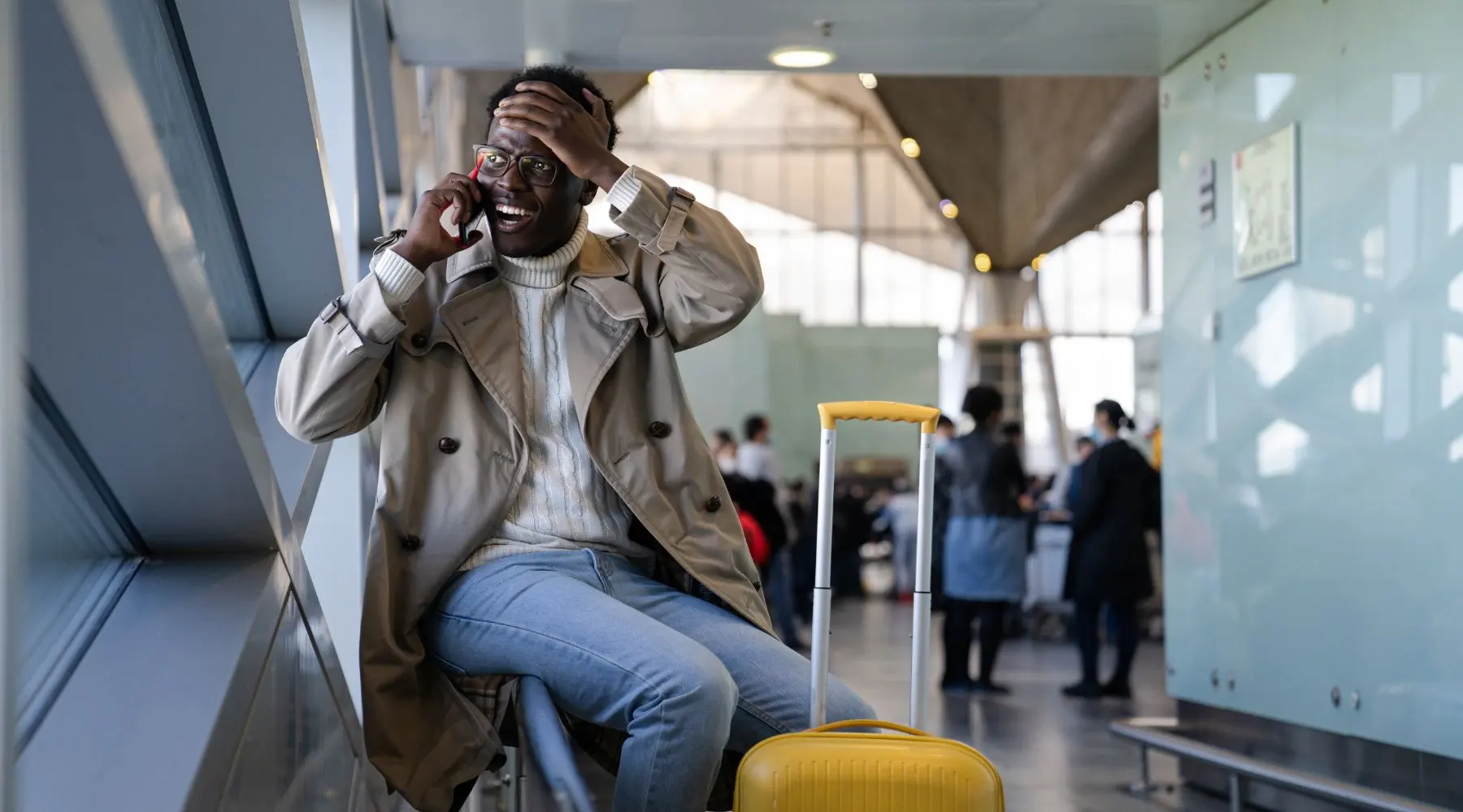 Man at airport_Canva_1800x1000