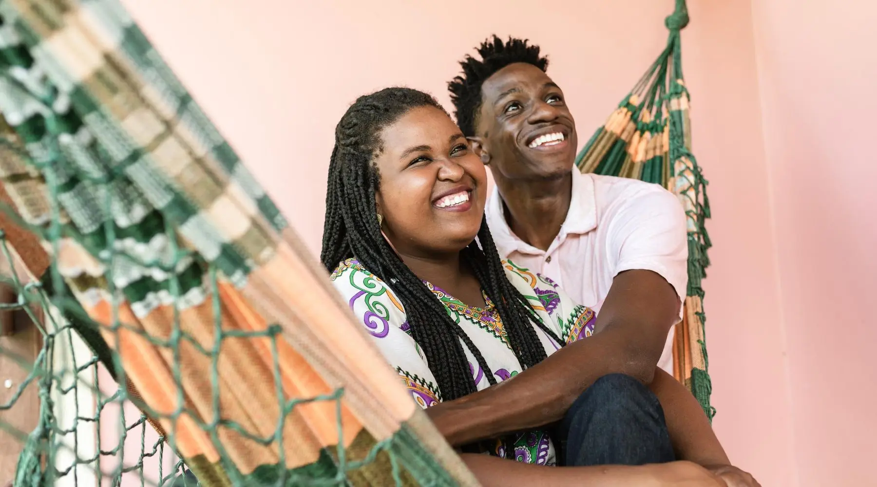 Couple_Sitting_In_Hammock_Canva_1800x1000