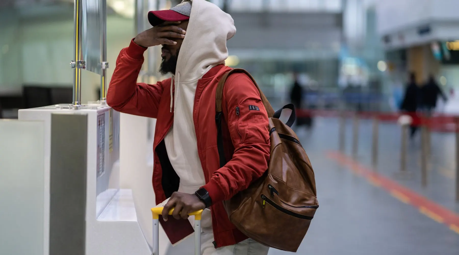 Man at airport_Canva_1800x1000 (1)