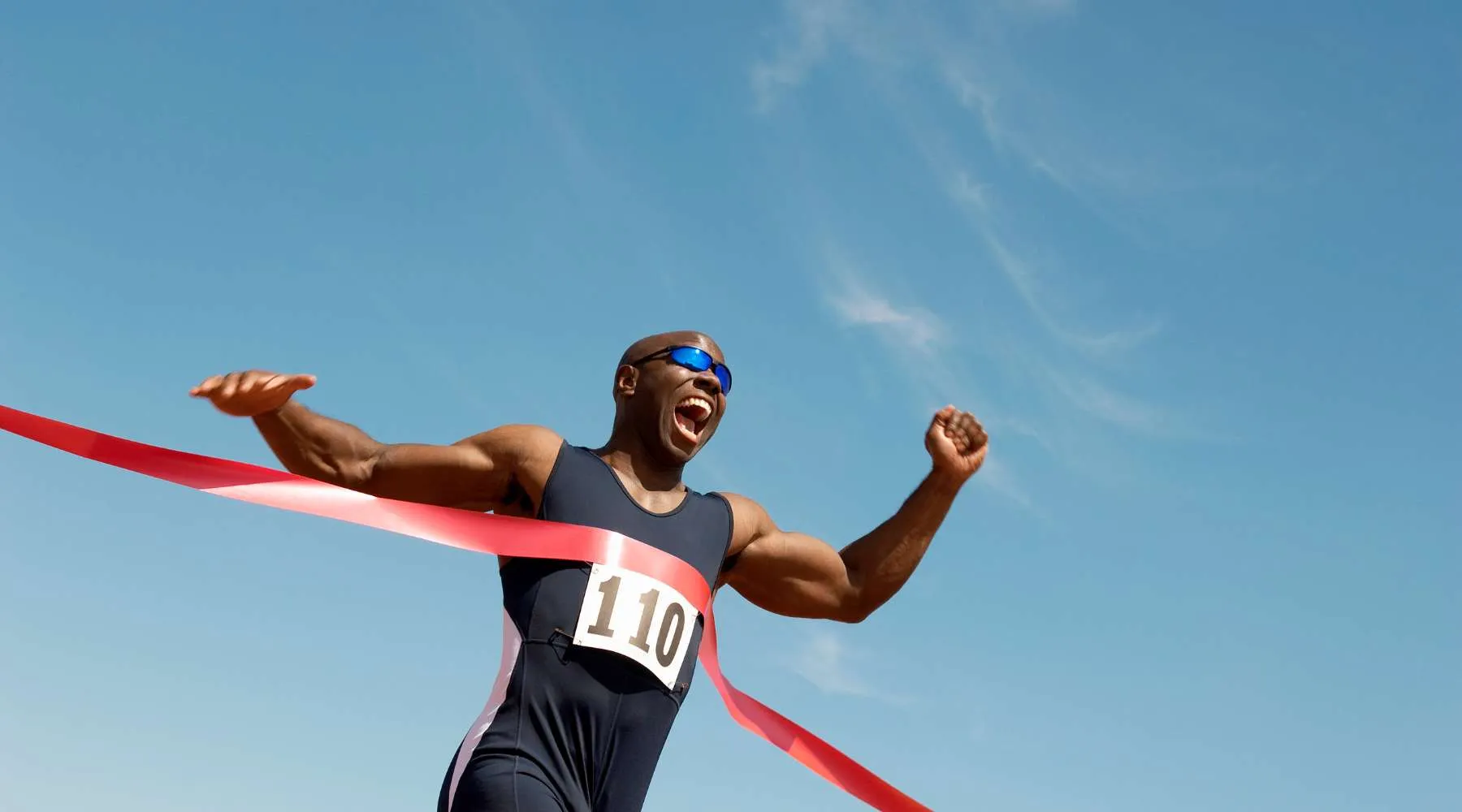 Runner crossing finish line