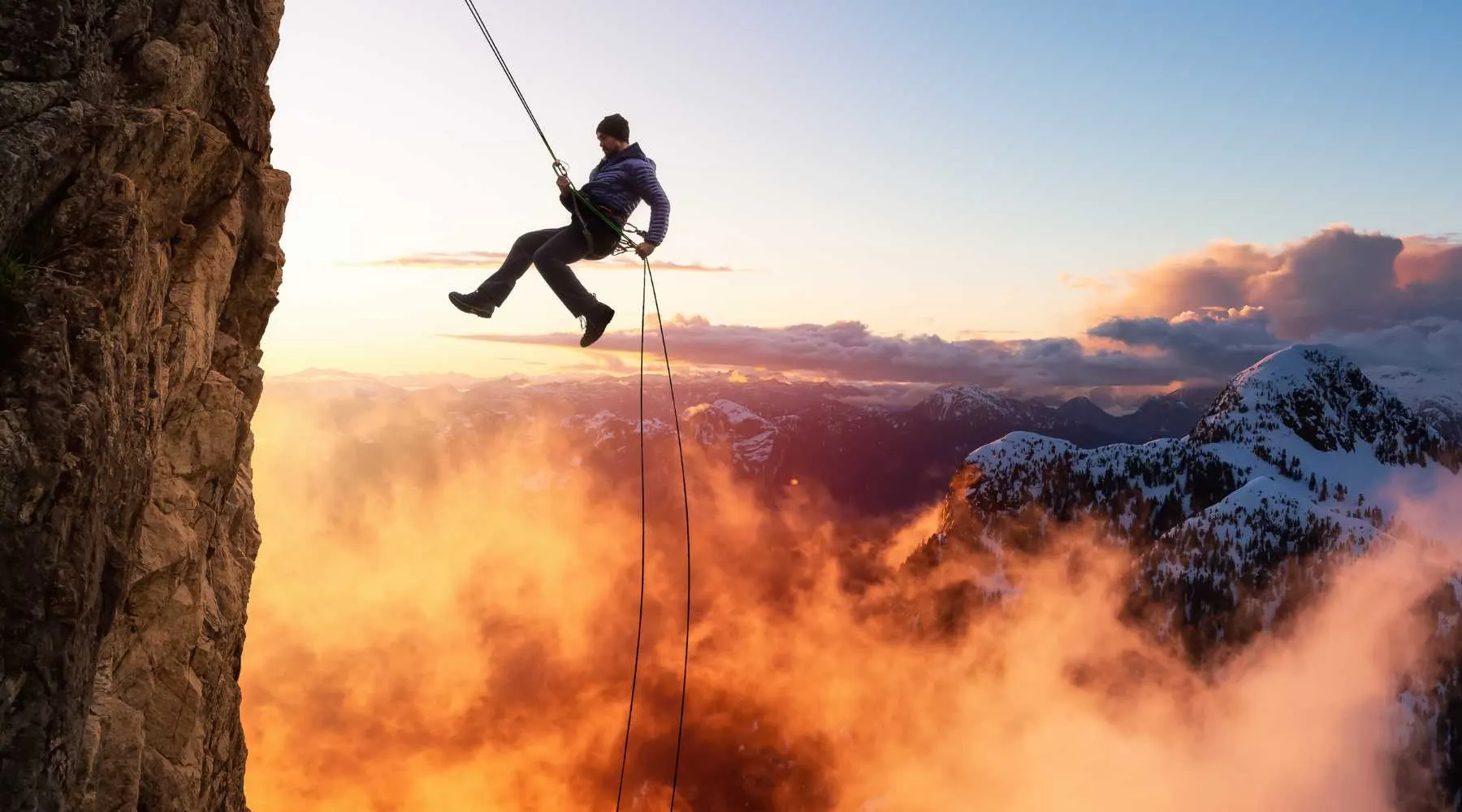 man abseiling on a holiday