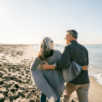 Couple walking on the beach