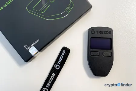 Trezor Model One and box on tabletop