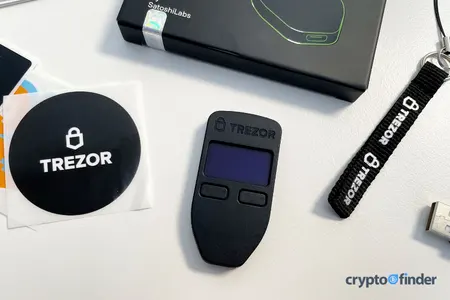Contents of Trezor Model One box on table